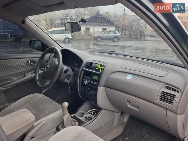 Зелений Мазда 626, об'ємом двигуна 2 л та пробігом 237 тис. км за 3000 $, фото 7 на Automoto.ua