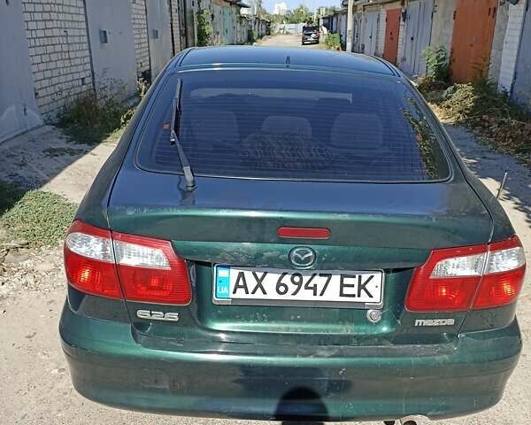 Зеленый Мазда 626, объемом двигателя 2 л и пробегом 280 тыс. км за 1700 $, фото 1 на Automoto.ua