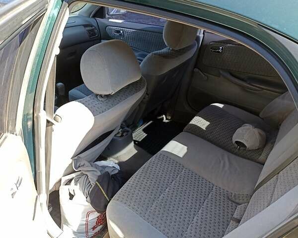 Зеленый Мазда 626, объемом двигателя 2 л и пробегом 280 тыс. км за 1700 $, фото 3 на Automoto.ua