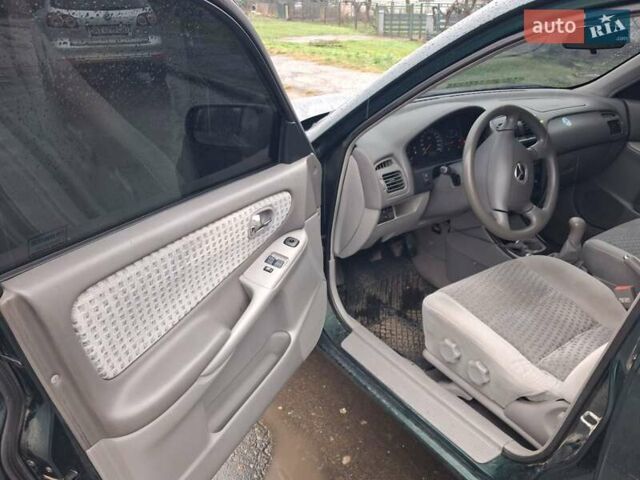 Зелений Мазда 626, об'ємом двигуна 2 л та пробігом 237 тис. км за 3000 $, фото 13 на Automoto.ua