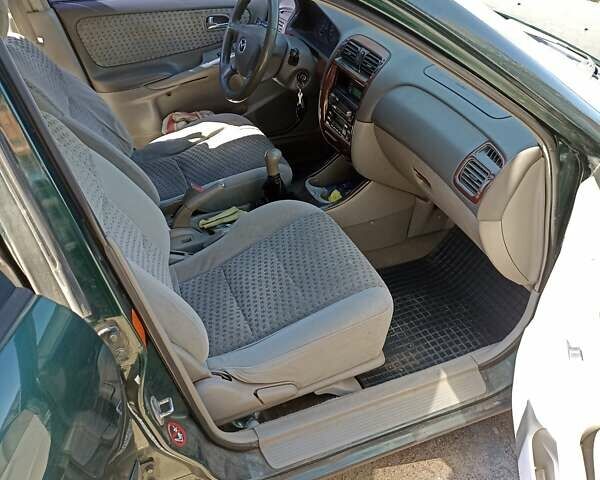 Зеленый Мазда 626, объемом двигателя 2 л и пробегом 280 тыс. км за 1700 $, фото 2 на Automoto.ua