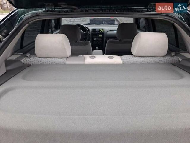 Зелений Мазда 626, об'ємом двигуна 2 л та пробігом 237 тис. км за 3000 $, фото 11 на Automoto.ua