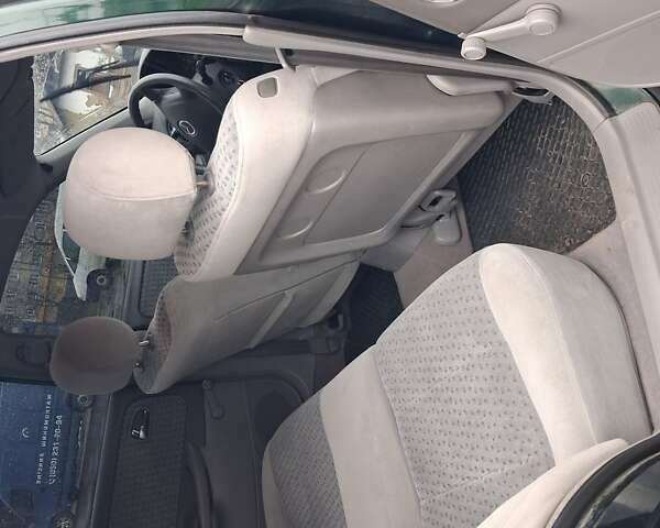 Зелений Мазда 626, об'ємом двигуна 2 л та пробігом 237 тис. км за 3000 $, фото 9 на Automoto.ua