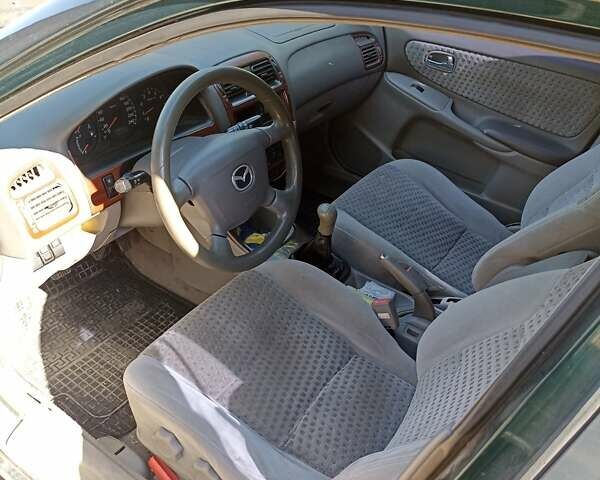 Зеленый Мазда 626, объемом двигателя 2 л и пробегом 280 тыс. км за 1700 $, фото 4 на Automoto.ua