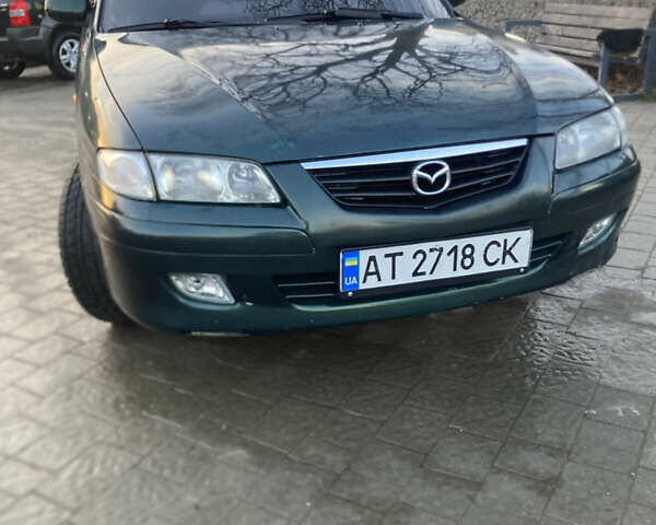 Зеленый Мазда 626, объемом двигателя 2 л и пробегом 281 тыс. км за 3150 $, фото 1 на Automoto.ua