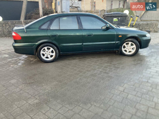 Зеленый Мазда 626, объемом двигателя 2 л и пробегом 281 тыс. км за 3150 $, фото 2 на Automoto.ua