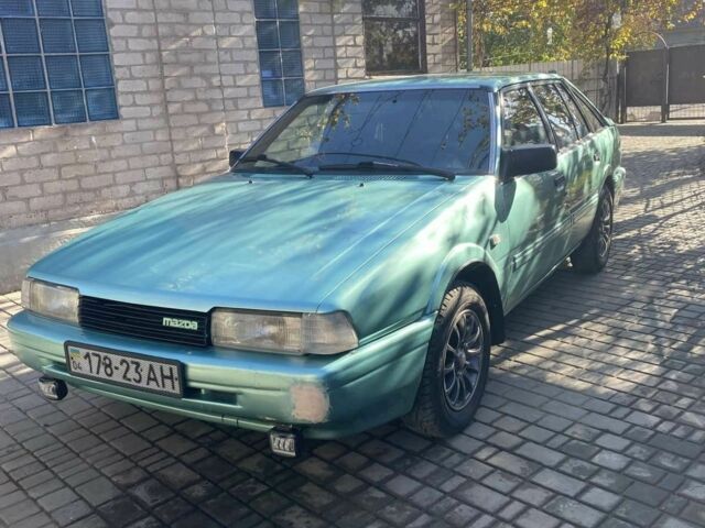 Зеленый Мазда 626, объемом двигателя 2 л и пробегом 175 тыс. км за 1000 $, фото 1 на Automoto.ua