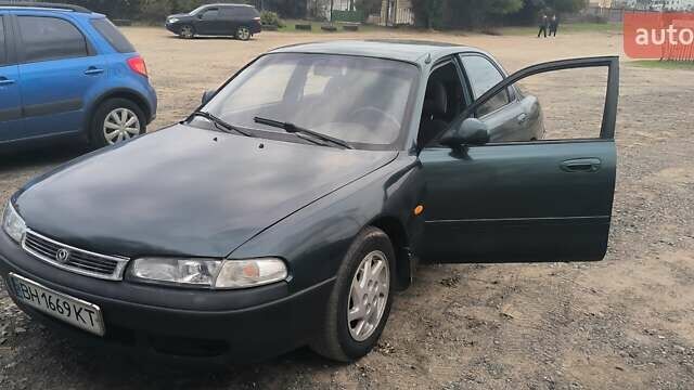 Зелений Мазда 626, об'ємом двигуна 1.8 л та пробігом 455 тис. км за 1752 $, фото 7 на Automoto.ua