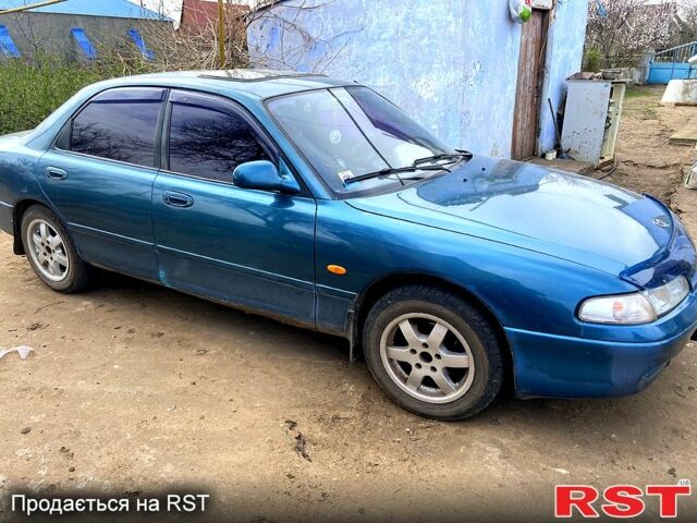 Зеленый Мазда 626, объемом двигателя 2 л и пробегом 416 тыс. км за 2300 $, фото 1 на Automoto.ua