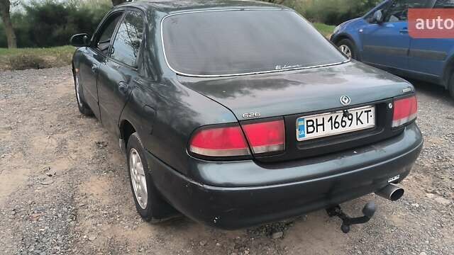 Зелений Мазда 626, об'ємом двигуна 1.8 л та пробігом 455 тис. км за 1752 $, фото 5 на Automoto.ua