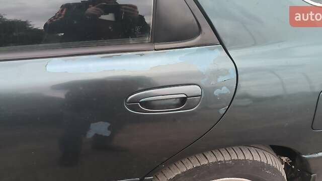 Зелений Мазда 626, об'ємом двигуна 1.8 л та пробігом 455 тис. км за 1752 $, фото 6 на Automoto.ua