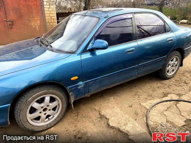 Зеленый Мазда 626, объемом двигателя 2 л и пробегом 416 тыс. км за 2300 $, фото 3 на Automoto.ua