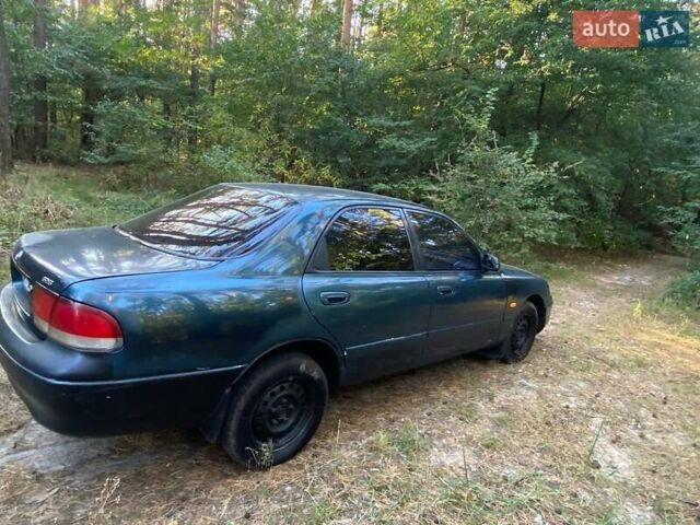 Зеленый Мазда 626, объемом двигателя 2 л и пробегом 340 тыс. км за 1500 $, фото 2 на Automoto.ua