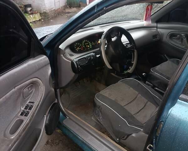 Зеленый Мазда 626, объемом двигателя 1.99 л и пробегом 350 тыс. км за 1000 $, фото 6 на Automoto.ua