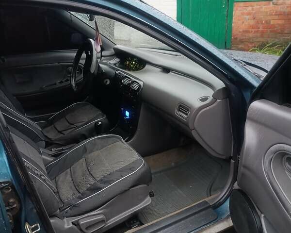 Зеленый Мазда 626, объемом двигателя 1.99 л и пробегом 350 тыс. км за 1000 $, фото 5 на Automoto.ua