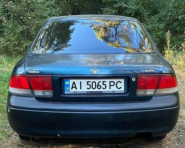 Зеленый Мазда 626, объемом двигателя 2 л и пробегом 340 тыс. км за 1500 $, фото 7 на Automoto.ua