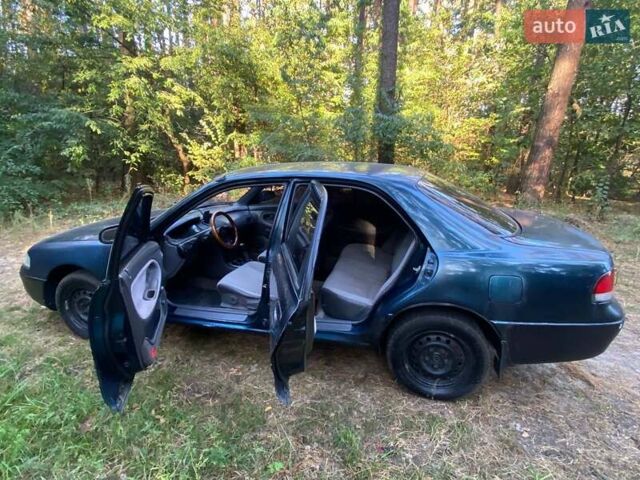 Зеленый Мазда 626, объемом двигателя 2 л и пробегом 340 тыс. км за 1500 $, фото 3 на Automoto.ua