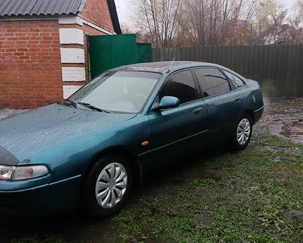 Зеленый Мазда 626, объемом двигателя 1.99 л и пробегом 350 тыс. км за 1000 $, фото 1 на Automoto.ua