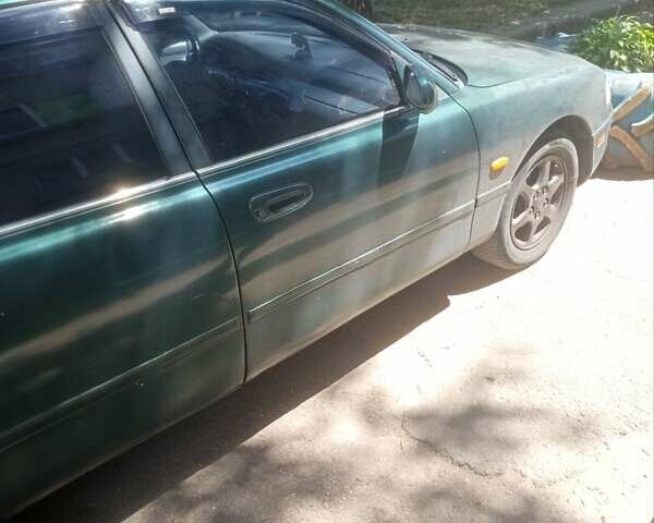 Зеленый Мазда 626, объемом двигателя 1.99 л и пробегом 440 тыс. км за 1900 $, фото 4 на Automoto.ua