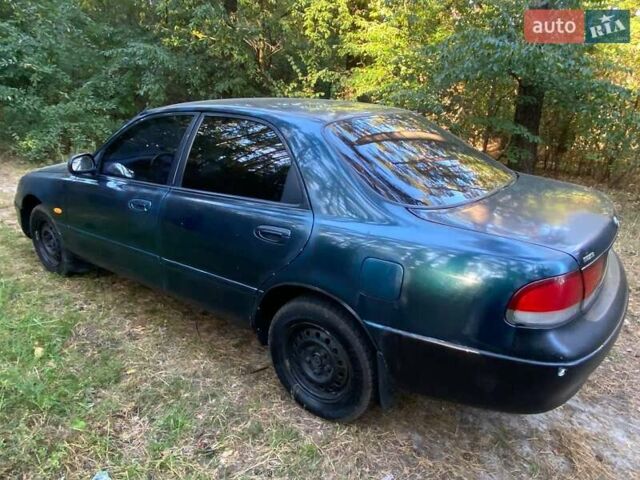 Зеленый Мазда 626, объемом двигателя 2 л и пробегом 340 тыс. км за 1500 $, фото 6 на Automoto.ua