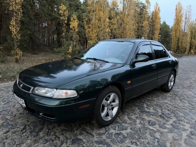 Зеленый Мазда 626, объемом двигателя 2 л и пробегом 265 тыс. км за 2250 $, фото 1 на Automoto.ua