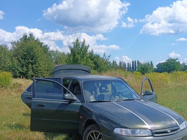 Зеленый Мазда 626, объемом двигателя 2 л и пробегом 365 тыс. км за 500 $, фото 1 на Automoto.ua