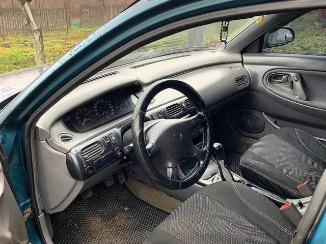 Зеленый Мазда 626, объемом двигателя 2 л и пробегом 1 тыс. км за 3074 $, фото 3 на Automoto.ua