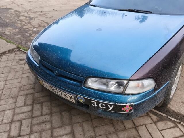 Зеленый Мазда 626, объемом двигателя 1.8 л и пробегом 330 тыс. км за 1000 $, фото 1 на Automoto.ua