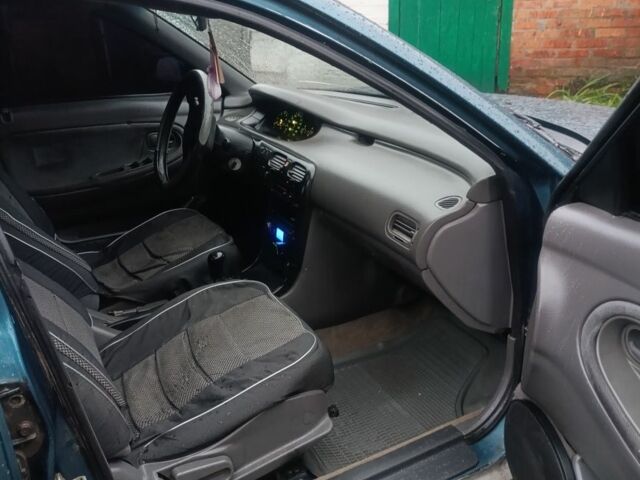 Зеленый Мазда 626, объемом двигателя 2 л и пробегом 350 тыс. км за 1200 $, фото 5 на Automoto.ua