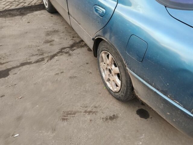 Зеленый Мазда 626, объемом двигателя 1.8 л и пробегом 330 тыс. км за 1000 $, фото 2 на Automoto.ua