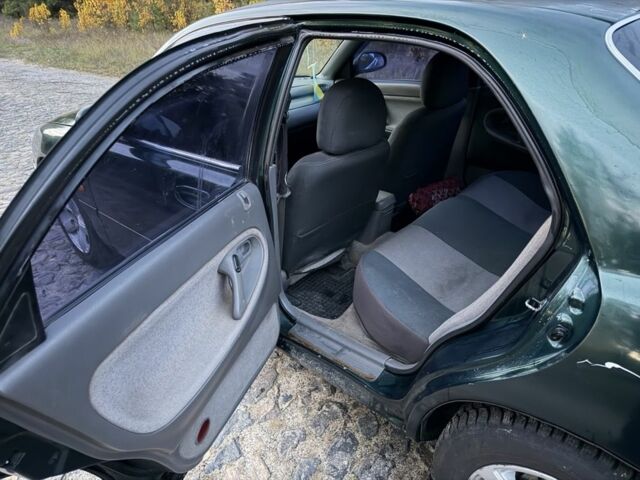 Зеленый Мазда 626, объемом двигателя 2 л и пробегом 265 тыс. км за 2250 $, фото 12 на Automoto.ua