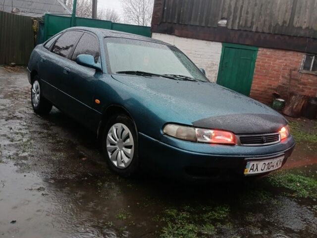 Зеленый Мазда 626, объемом двигателя 2 л и пробегом 350 тыс. км за 1200 $, фото 4 на Automoto.ua