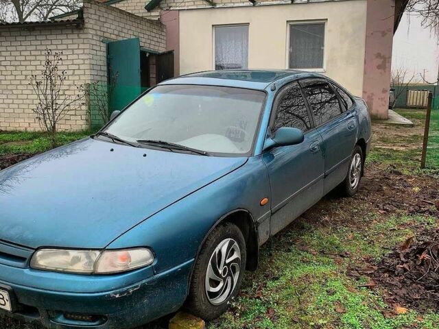 Зеленый Мазда 626, объемом двигателя 2 л и пробегом 1 тыс. км за 3074 $, фото 1 на Automoto.ua