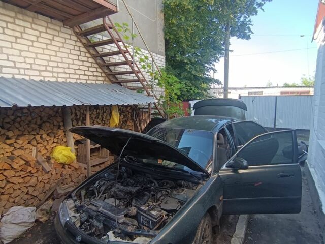 Зеленый Мазда 626, объемом двигателя 2 л и пробегом 365 тыс. км за 500 $, фото 2 на Automoto.ua