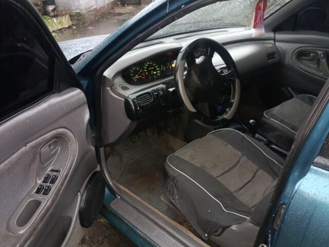 Зеленый Мазда 626, объемом двигателя 2 л и пробегом 350 тыс. км за 1200 $, фото 6 на Automoto.ua