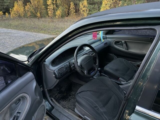 Зеленый Мазда 626, объемом двигателя 2 л и пробегом 265 тыс. км за 2250 $, фото 11 на Automoto.ua