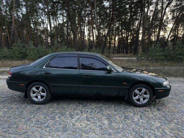 Зеленый Мазда 626, объемом двигателя 2 л и пробегом 265 тыс. км за 2250 $, фото 6 на Automoto.ua