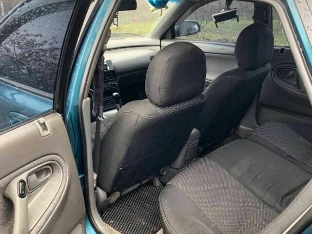 Зеленый Мазда 626, объемом двигателя 2 л и пробегом 1 тыс. км за 3074 $, фото 2 на Automoto.ua