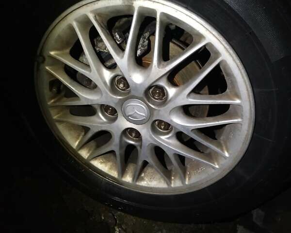 Зеленый Мазда 626, объемом двигателя 2 л и пробегом 345 тыс. км за 800 $, фото 8 на Automoto.ua