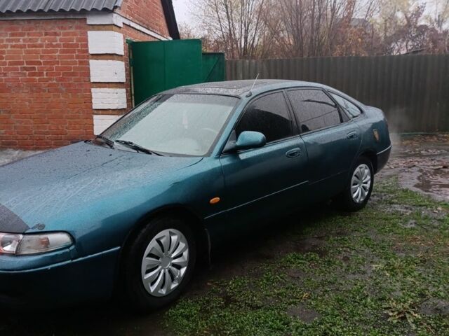 Зеленый Мазда 626, объемом двигателя 2 л и пробегом 350 тыс. км за 1200 $, фото 2 на Automoto.ua