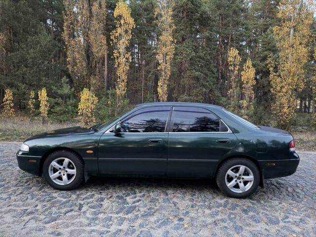 Зеленый Мазда 626, объемом двигателя 2 л и пробегом 265 тыс. км за 2250 $, фото 7 на Automoto.ua