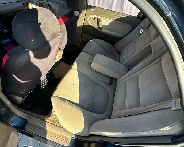 Зеленый Мазда 626, объемом двигателя 2 л и пробегом 300 тыс. км за 1300 $, фото 2 на Automoto.ua