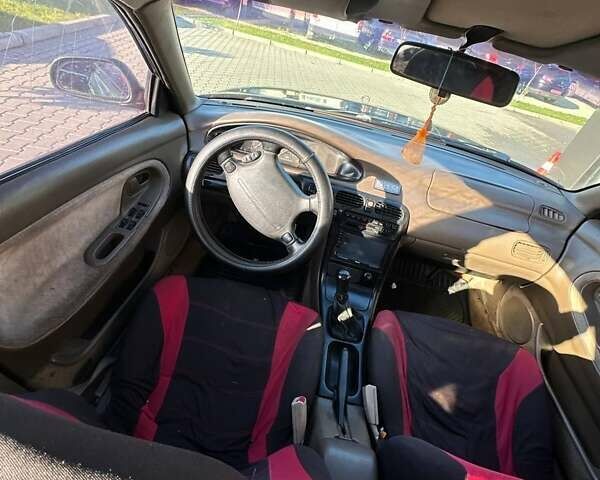 Зеленый Мазда 626, объемом двигателя 2 л и пробегом 300 тыс. км за 1300 $, фото 3 на Automoto.ua