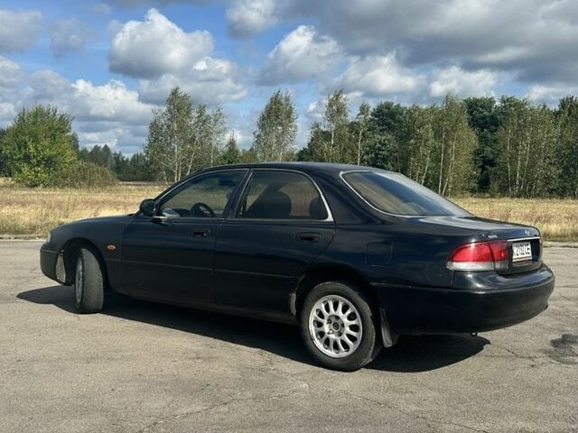 Зеленый Мазда 626, объемом двигателя 2 л и пробегом 342 тыс. км за 1450 $, фото 2 на Automoto.ua