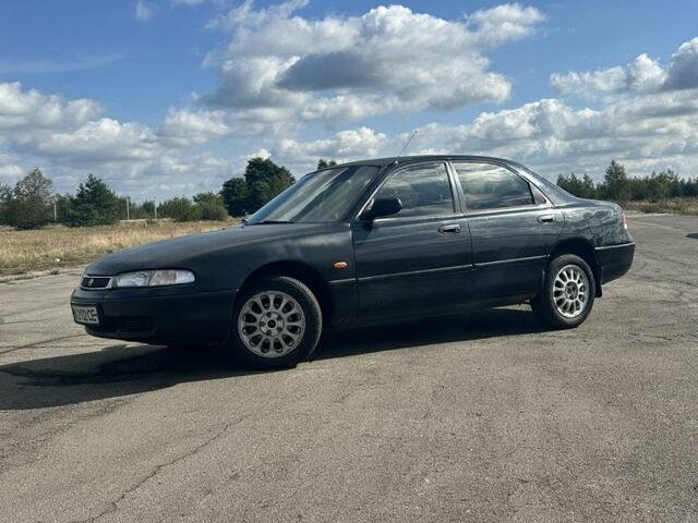 Зеленый Мазда 626, объемом двигателя 2 л и пробегом 342 тыс. км за 1450 $, фото 1 на Automoto.ua