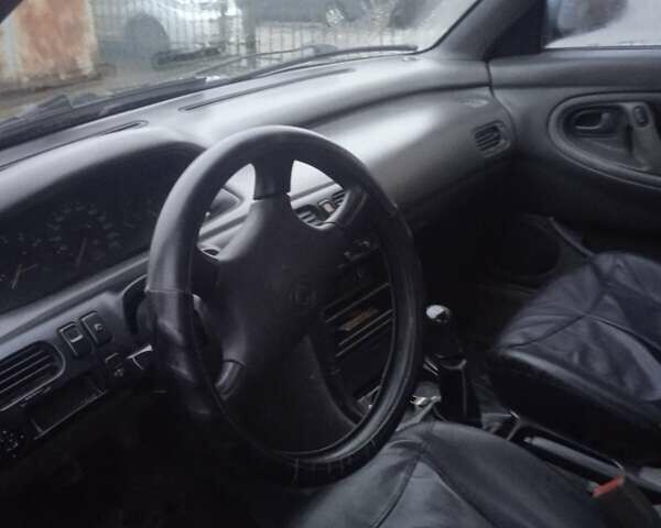 Зеленый Мазда 626, объемом двигателя 2 л и пробегом 200 тыс. км за 1500 $, фото 1 на Automoto.ua