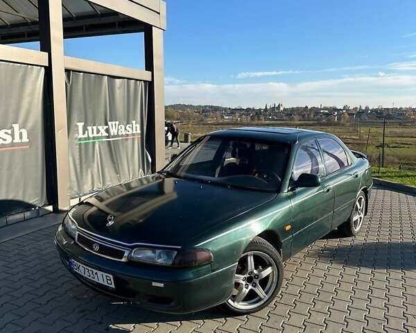 Зеленый Мазда 626, объемом двигателя 2 л и пробегом 300 тыс. км за 1300 $, фото 7 на Automoto.ua