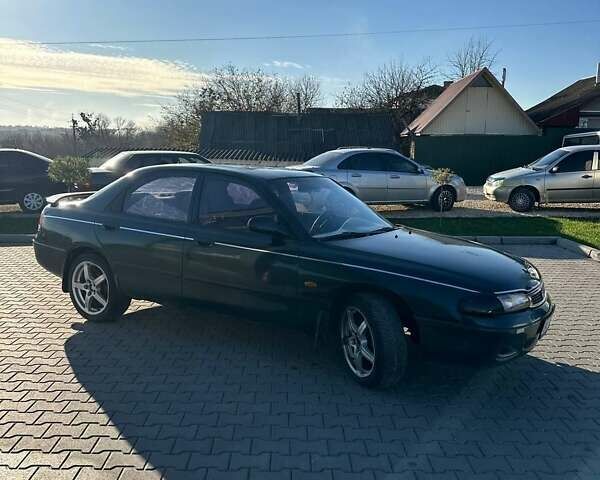 Зеленый Мазда 626, объемом двигателя 2 л и пробегом 300 тыс. км за 1300 $, фото 12 на Automoto.ua