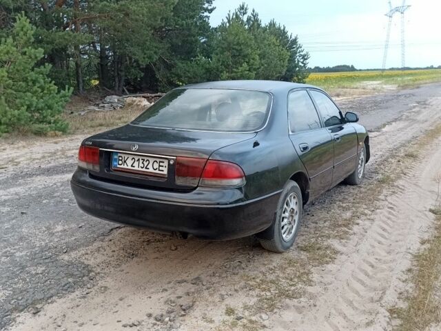 Зеленый Мазда 626, объемом двигателя 2 л и пробегом 334 тыс. км за 1200 $, фото 1 на Automoto.ua