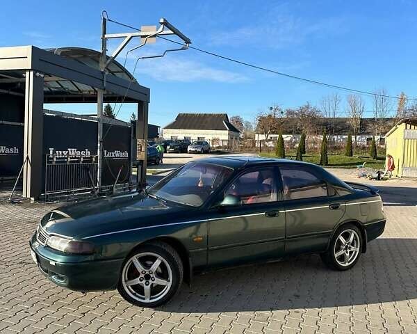 Зеленый Мазда 626, объемом двигателя 2 л и пробегом 300 тыс. км за 1300 $, фото 4 на Automoto.ua